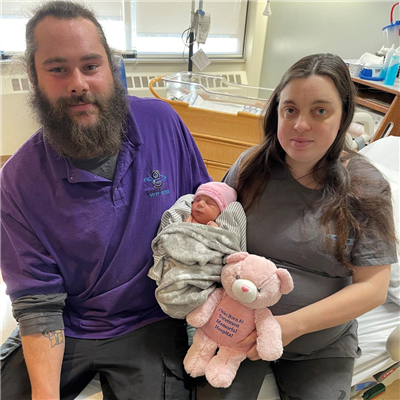 Parents Sara Wright and Corey Offen with their new