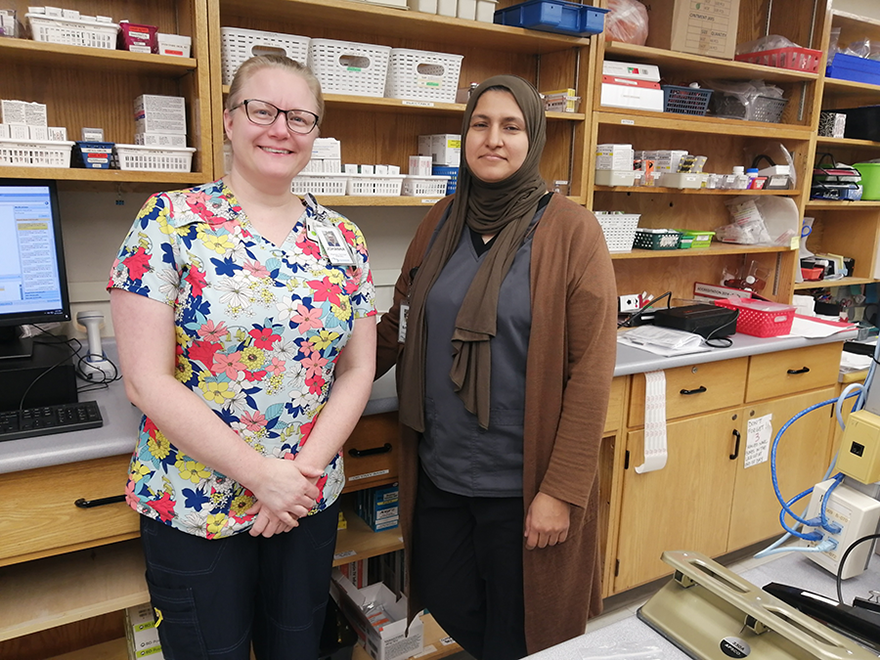 pharmacy technicians posing for photo in our pharmacy department